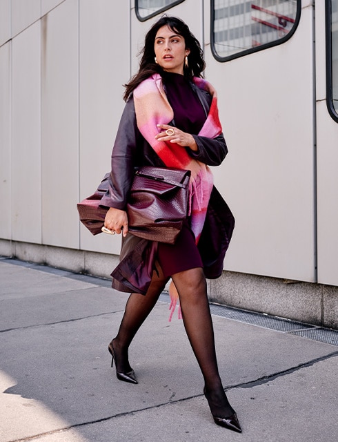 The modeli wearing a black outfit
