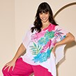 The model is wearing a purple printed T-shirt