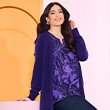 The model wears a purple cardigan and a shier