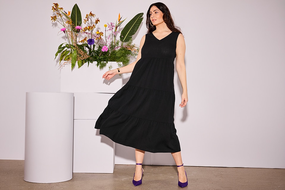 The model is wearing a black dress.