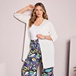 The model is wearing a white cardigan.