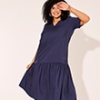 The model is wearing a navy blue dress.
