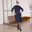 The model is wearing a blue dress.