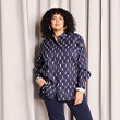 The model is wearing a blouse.