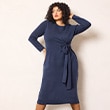 The model is wearing a blue dress.