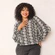 The model is wearing a blouse.