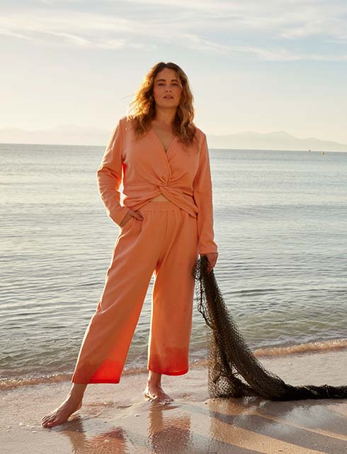 Woman posing on beach 