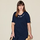 The model is wearing a blue dress
