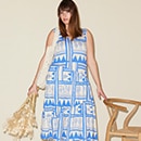 The model is wearing a blue top