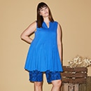 The model is wearing a short trouser with blue drawings