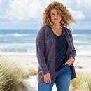 The model wears a bordeaux sweater