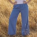 The model is wearing blue wide-leg trousers and a blue blouse


