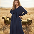 The model wears a blue blouse.