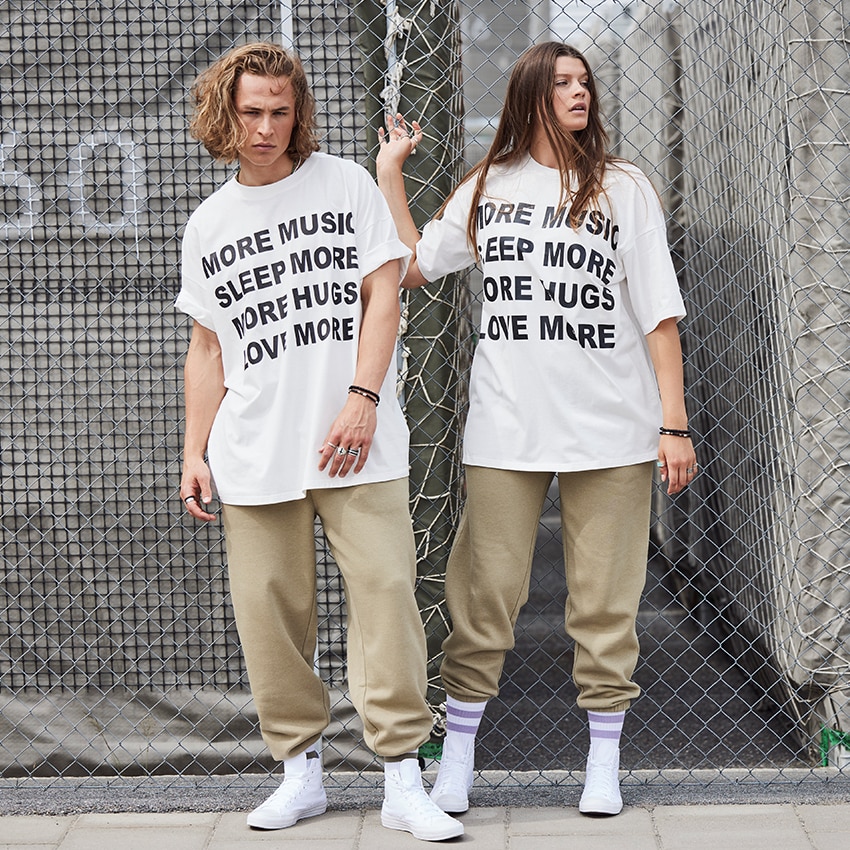 White unisex oversized t-shirt with statement print in black