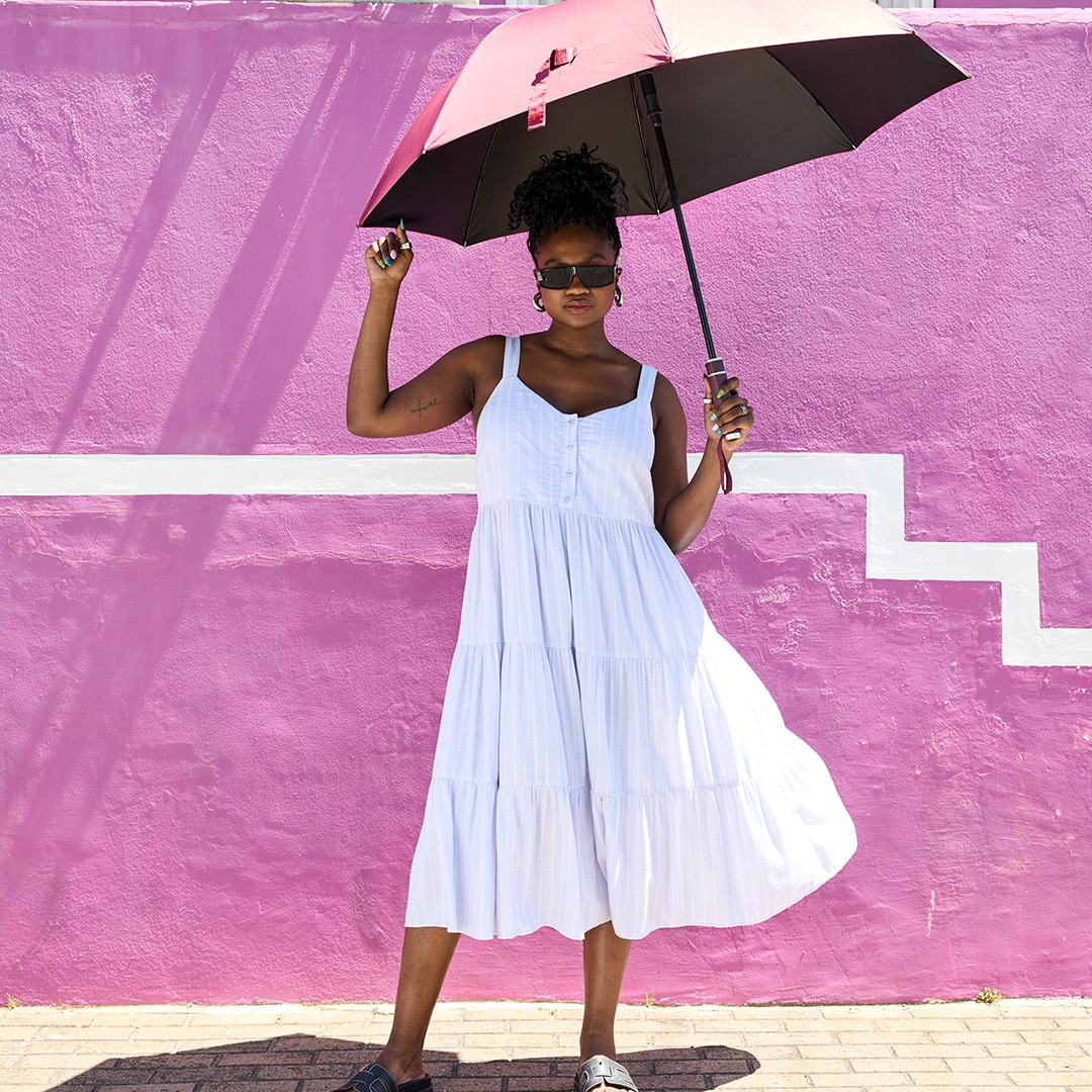 Model is wearing a armless black shirt
