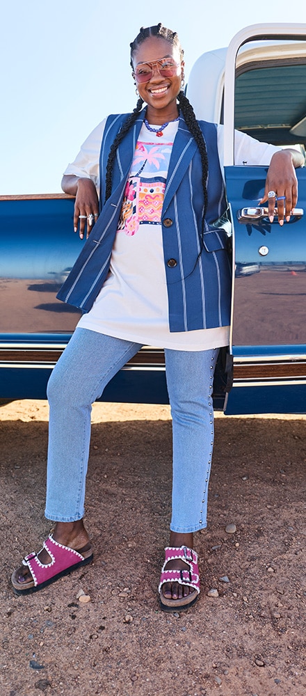 The model is wearing a denim jacket