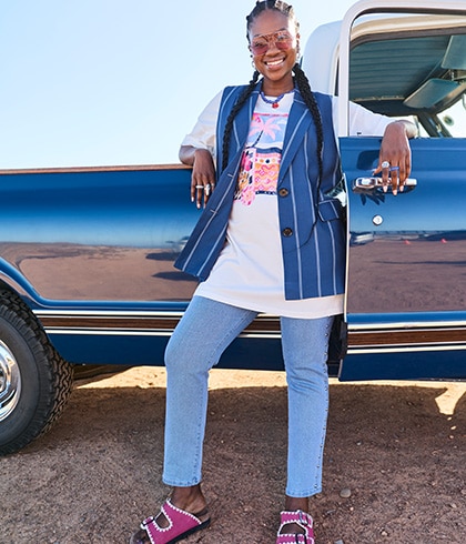 The model is wearing a denim jacket