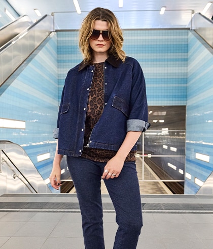 The model is wearing a jacket