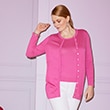 The model wears a cardigan and a pkes knit shirt