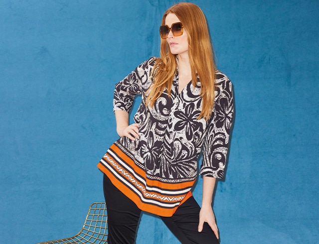 The model is wearing a patterned shirt