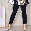 The model is wearing black tight pants.