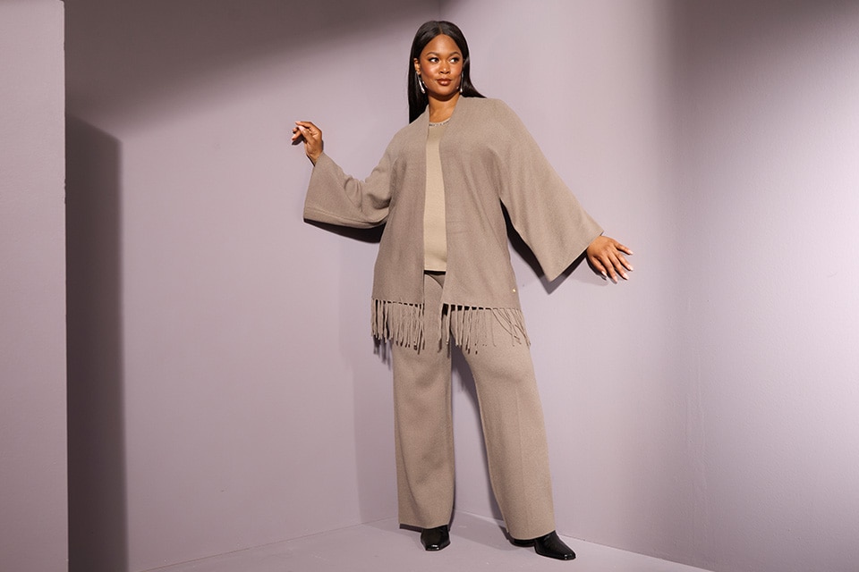 The model wears a jacket