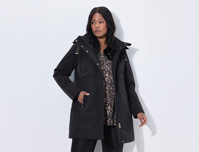 The model wears a jacket