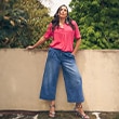 The model is wearing a blue jeans.