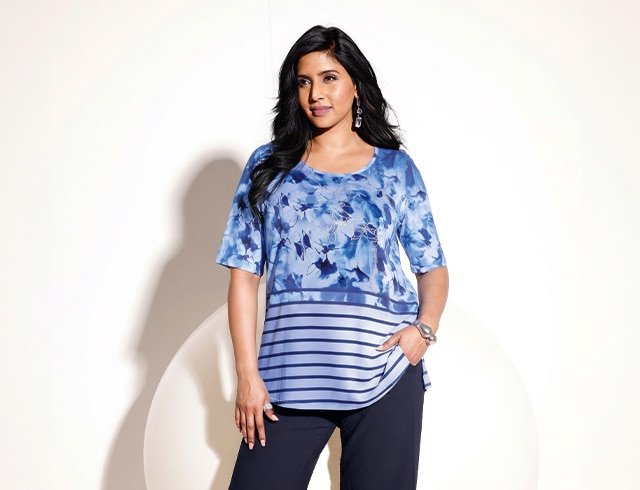 The model wears a slinky shirt