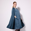 The model is wearing a blue dress.