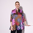 The model is wearing a blue blouse.