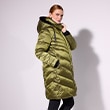 The model wears a green jacket.