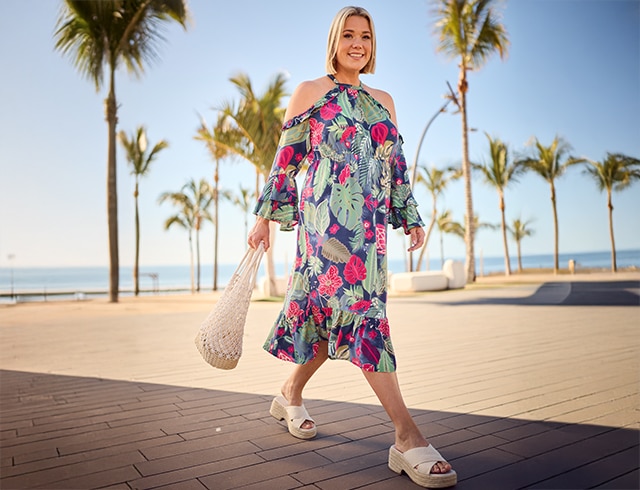 Model wears a mididress