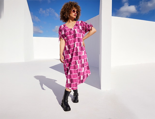 Model wears a mididress