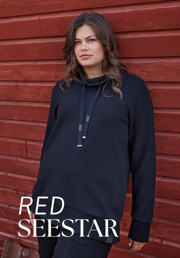 Model trägt türkises Kleid Korallen