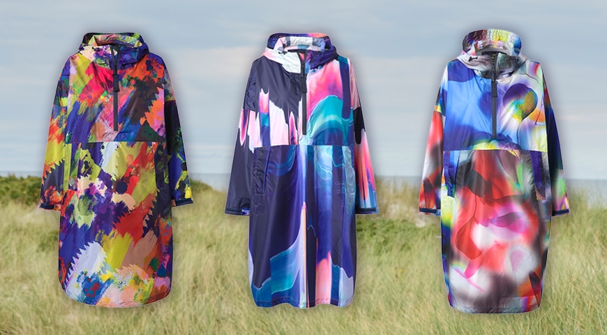 Woman wearing a blue jacket and leaning against the wall