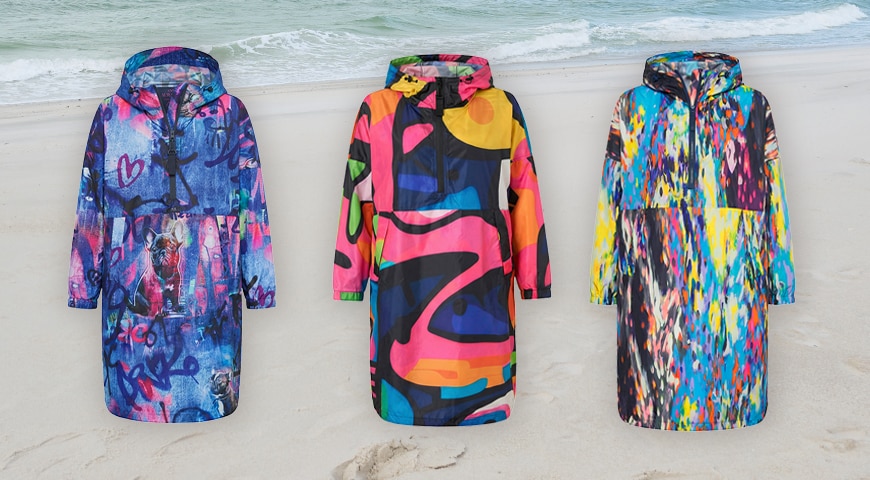 Woman wearing a blue jacket and leaning against the wall