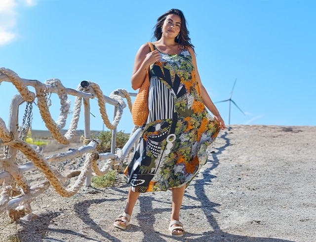 The model wears a bathrobe
