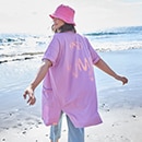 The model is wearing a colourful sweatshirt