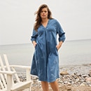 The model wears a blue dress