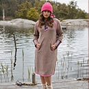 The model wears a blue dress