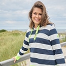 The model is wearing a colourful sweatshirt