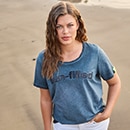 The model is wearing a quilted coat with a pattern