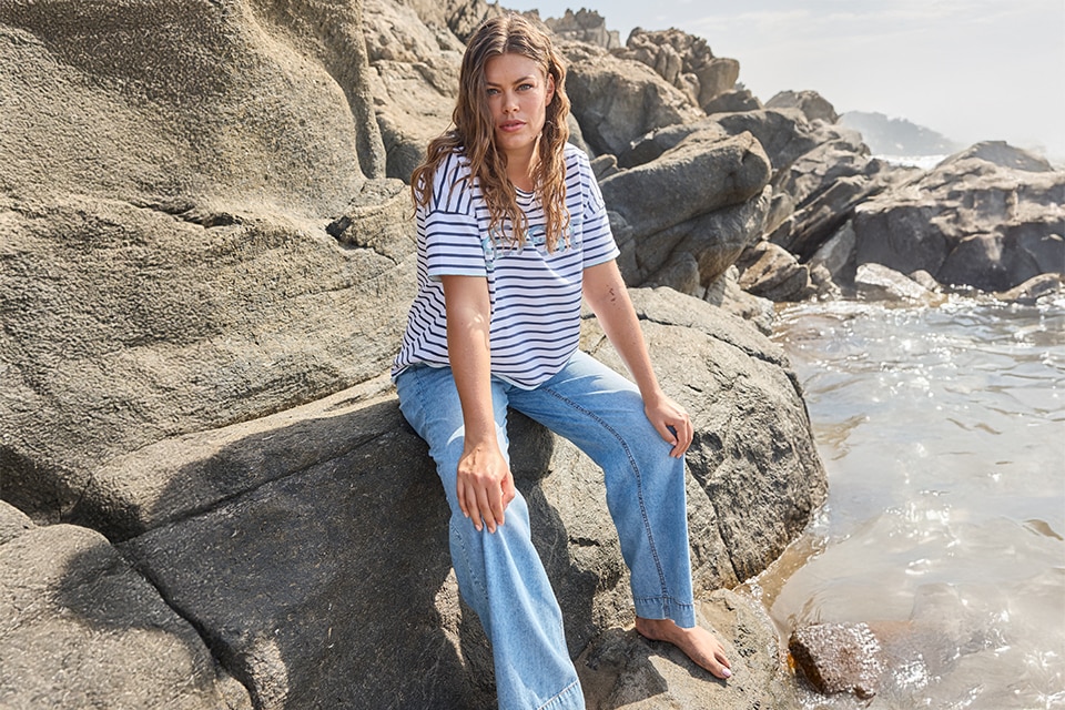 The model wearing a blue shirt