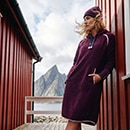 The model wears a dress