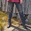 The model wears jeans