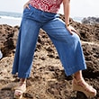 The model is wearing a jeans.