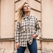 The model is wearing a blouse.