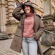 The model is wearing a Jacket.