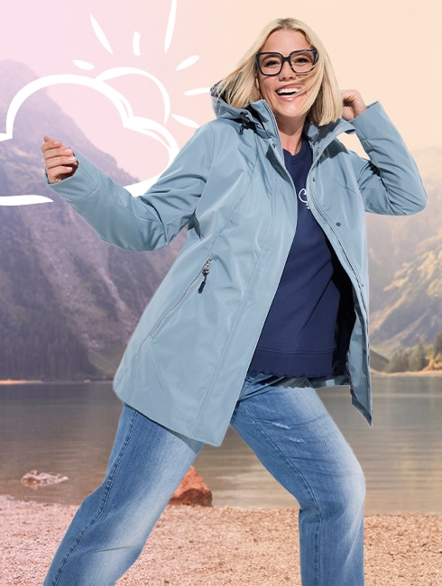 The model is wearing a light blue functional jacket